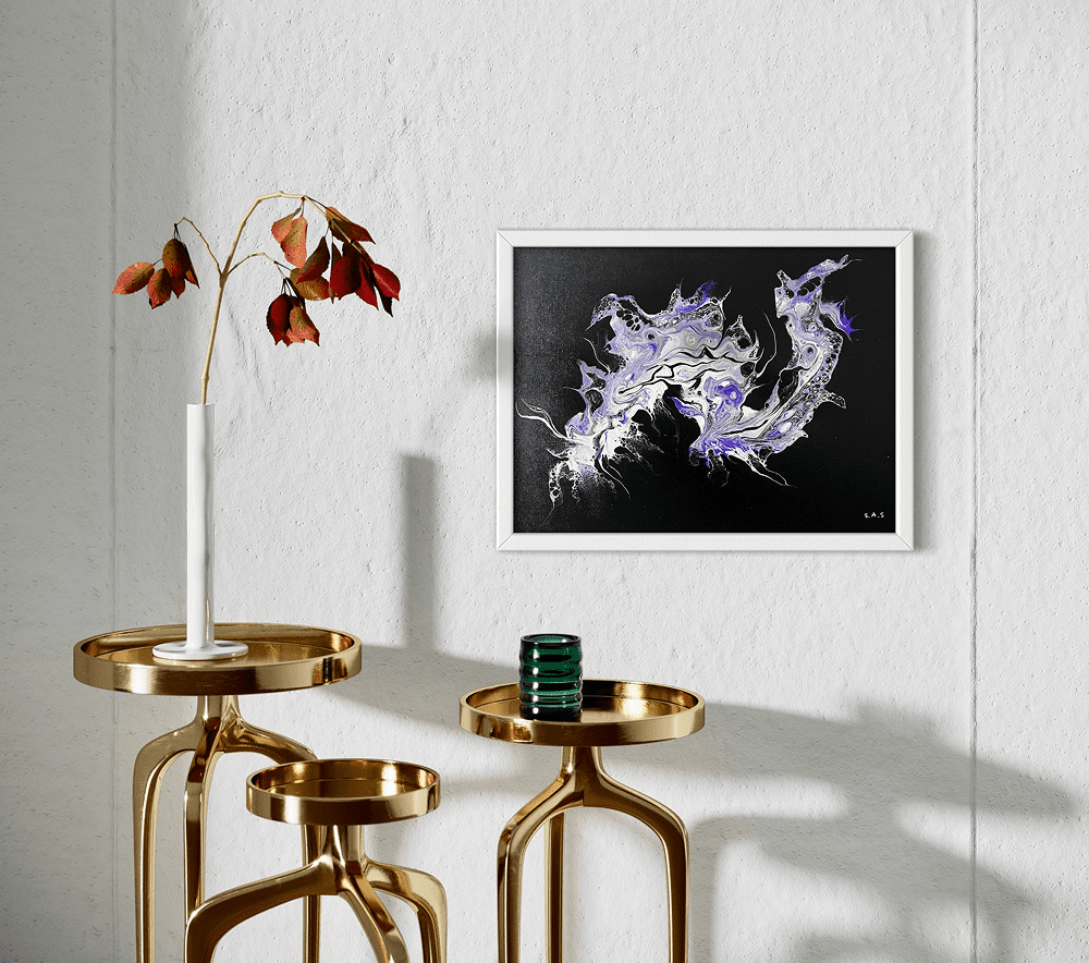 Modern art on wall with gold tables.
